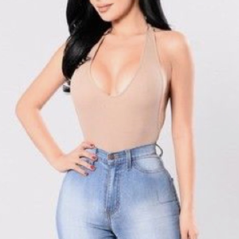 Fashion nova body suit(never been used)